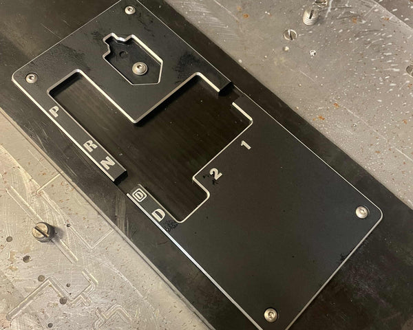 Metal bracket on a textured metal surface