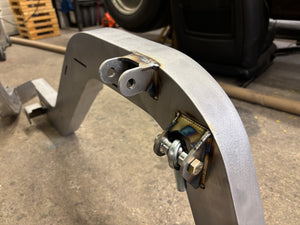 Metal component with bolts on a concrete floor