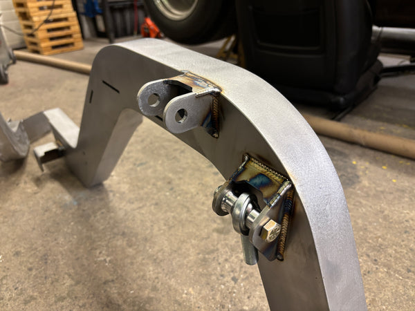 Metal component with bolts on a concrete floor