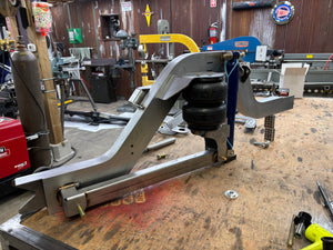 Mechanical component on a workbench in a workshop setting