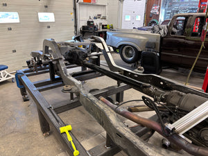 Undercarriage of a vehicle in a garage setting