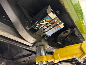 Close-up of a mechanical component inside a vehicle, a battery 