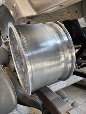 Metallic spool or reel in a mechanical setting