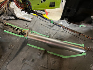 Transmission tunnel fabrication using clecos to hold panel in place