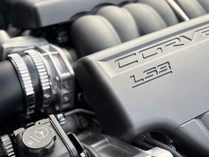 Close-up of a Corvette LS3 engine block with visible branding.